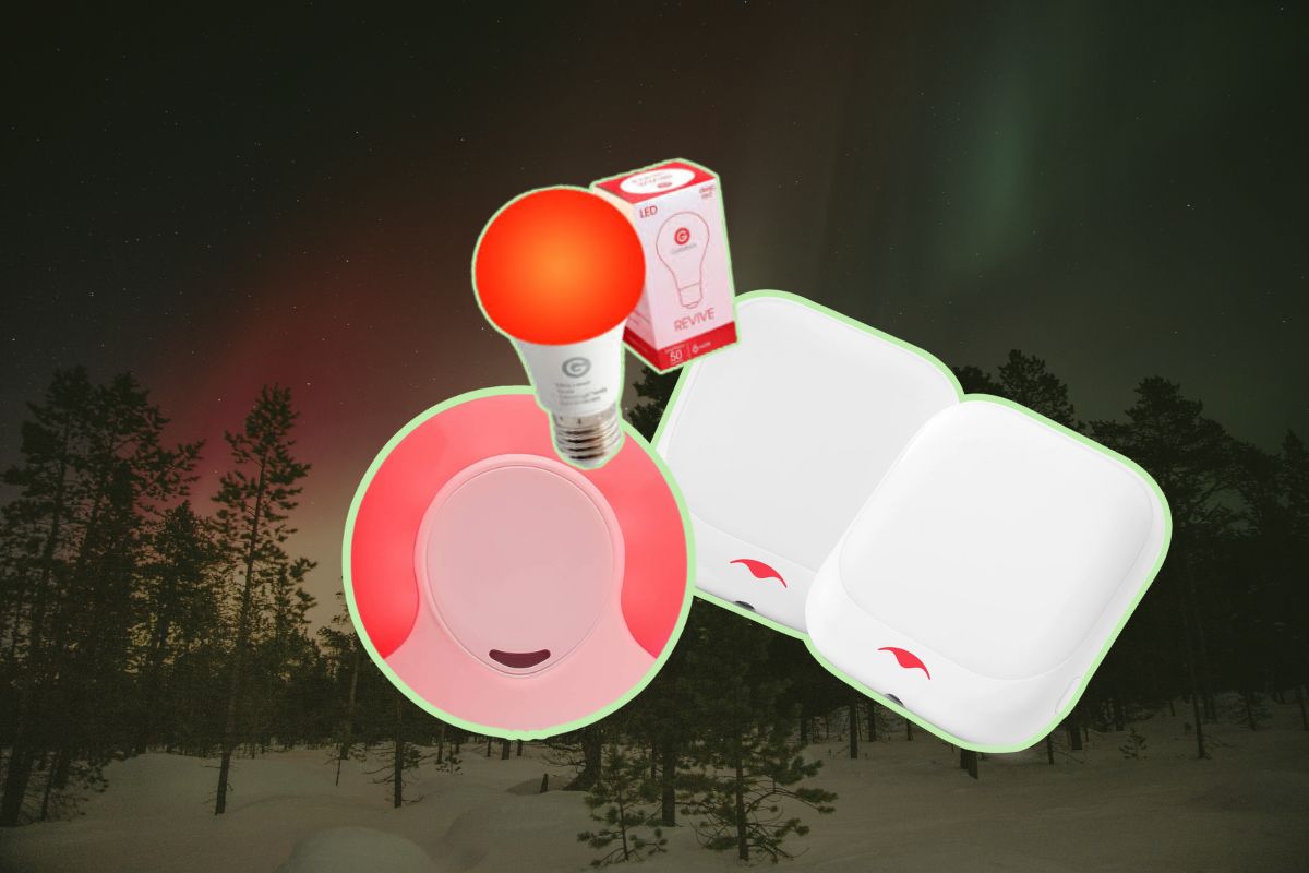 Red light night lights over a dark, evening wooded area background